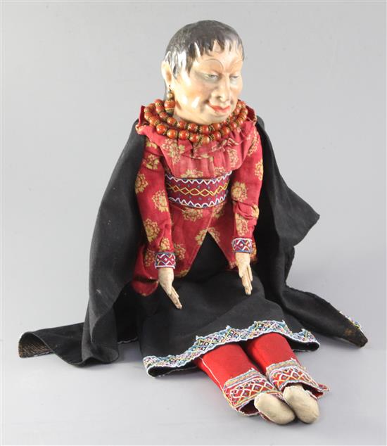 A Native American doll, height 21.25in.
